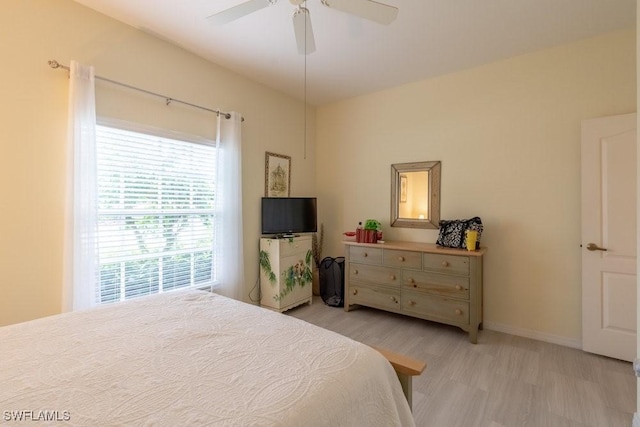 bedroom featuring ceiling fan and light wood-type flooring