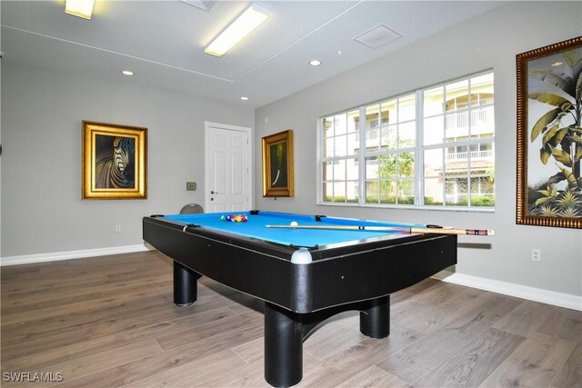 game room featuring hardwood / wood-style flooring and pool table