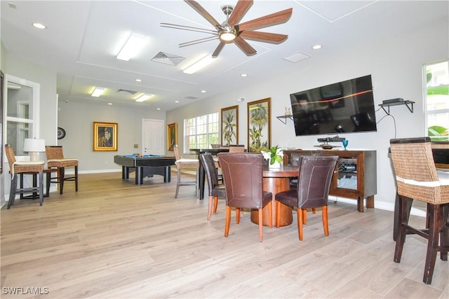 dining room featuring ceiling fan, light wood-type flooring, and pool table