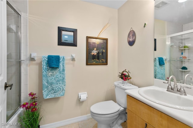 full bathroom with shower / bath combination with glass door, vanity, toilet, and tile patterned flooring