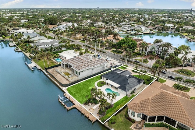 aerial view featuring a water view and a residential view