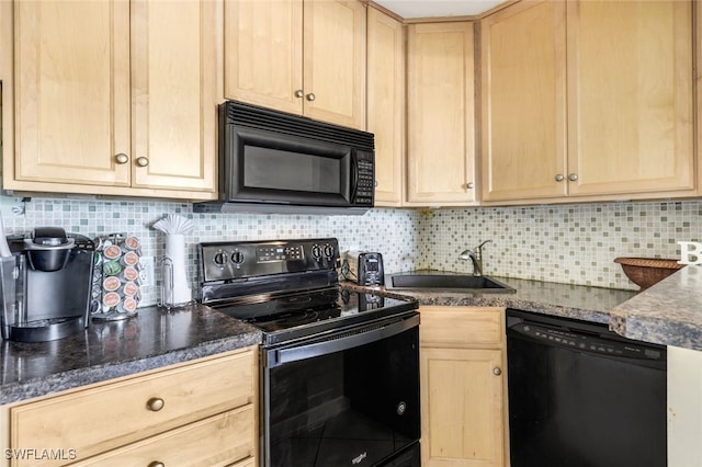 kitchen with sink, dark stone counters, decorative backsplash, light brown cabinetry, and black appliances