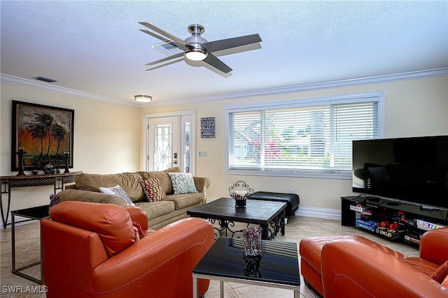 living room with ceiling fan, light tile patterned flooring, and ornamental molding