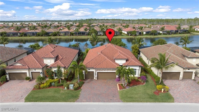 bird's eye view with a water view