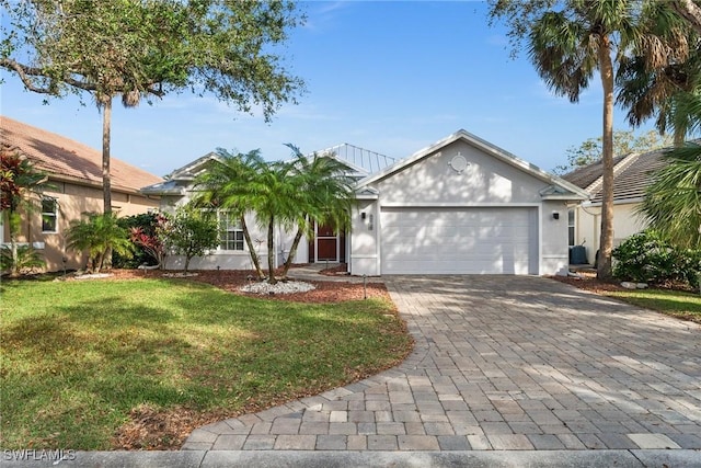 single story home with a front lawn and a garage