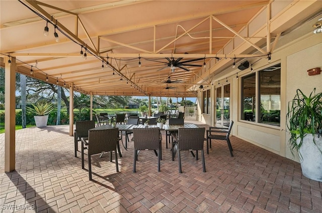 view of patio featuring ceiling fan