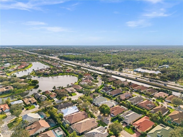 aerial view featuring a water view