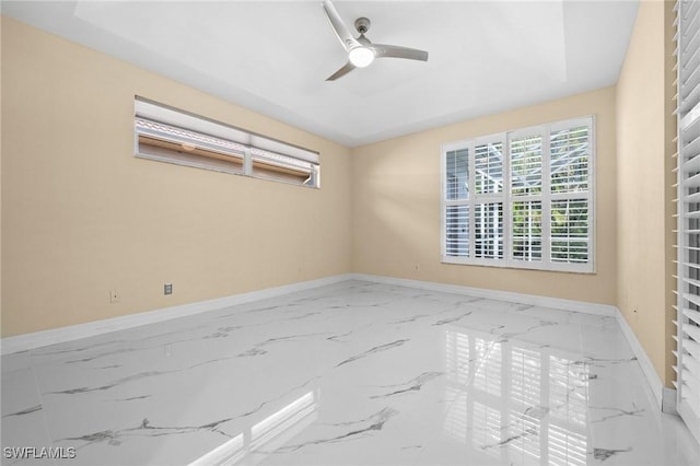 spare room featuring ceiling fan