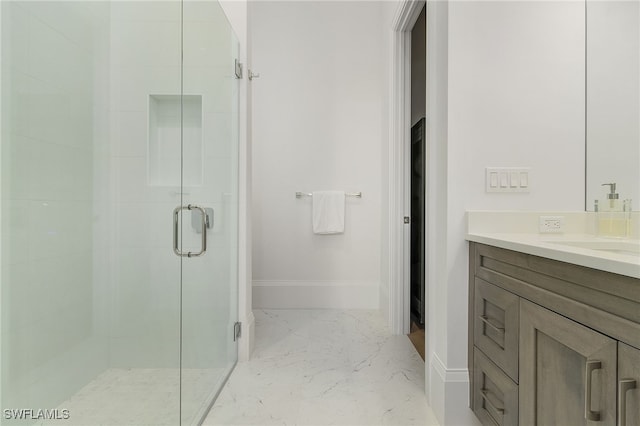 bathroom with vanity and walk in shower