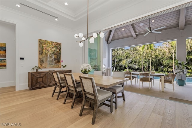 dining area with a towering ceiling, wood ceiling, ceiling fan, light hardwood / wood-style flooring, and beamed ceiling