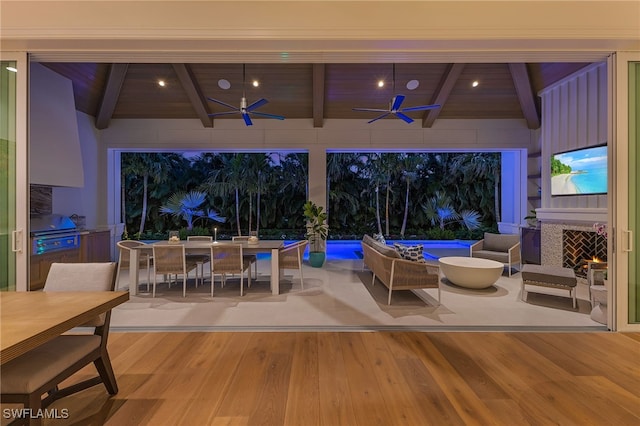 view of patio / terrace with a grill, ceiling fan, a swimming pool, and an outdoor hangout area