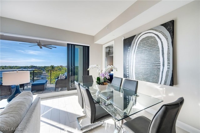 dining space with ceiling fan