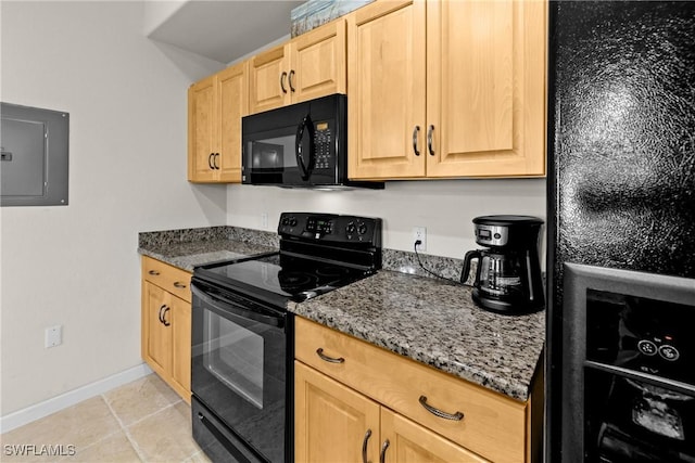 kitchen featuring electric panel, black appliances, dark stone countertops, light tile patterned floors, and light brown cabinetry