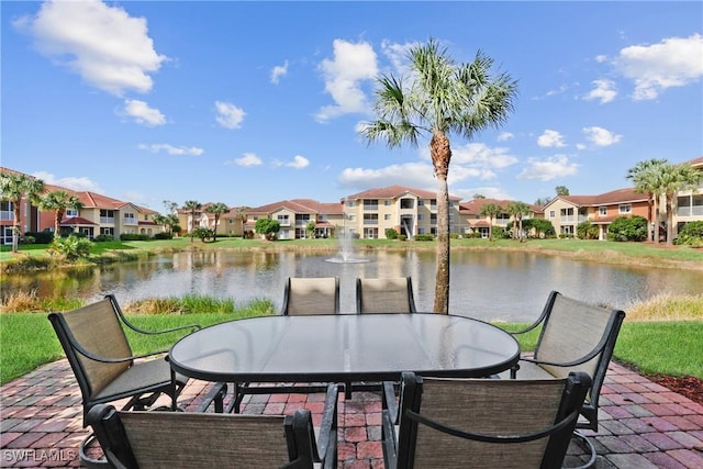 view of patio / terrace with a water view