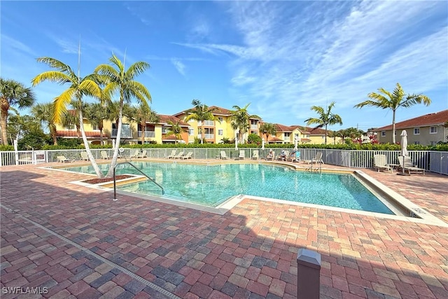 view of swimming pool with a patio