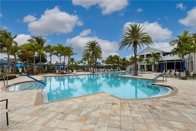 view of swimming pool with a patio