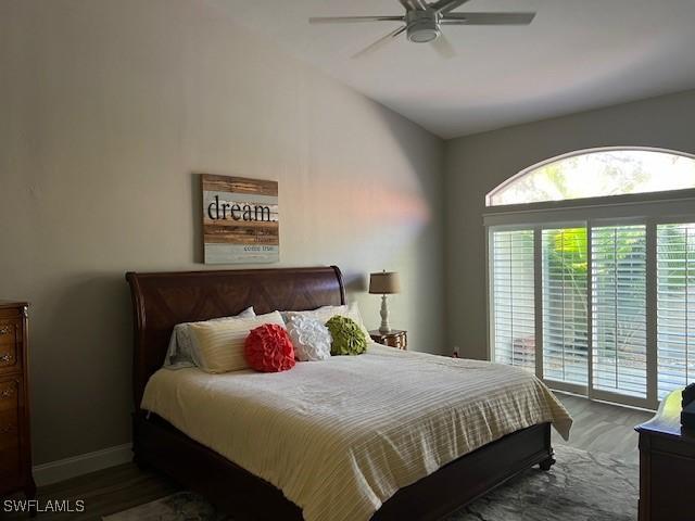 bedroom featuring access to outside and ceiling fan