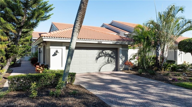 view of front of property with a garage