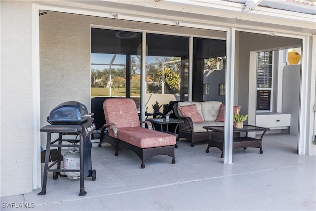 view of patio / terrace featuring an outdoor living space and a grill