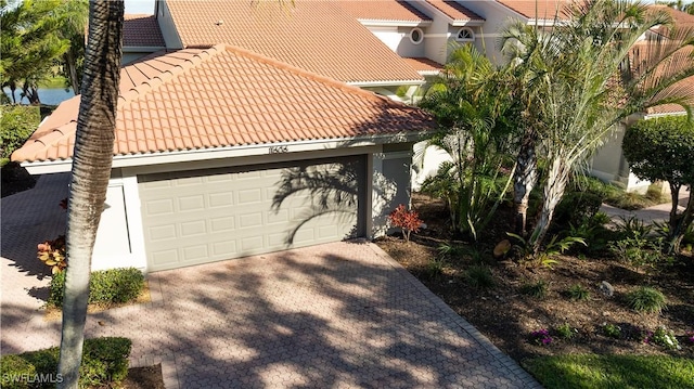 view of front of property with a garage