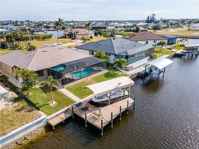 aerial view featuring a water view