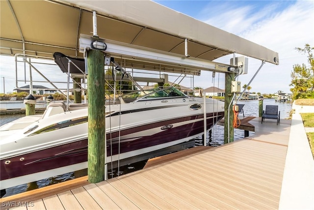 dock area featuring a water view