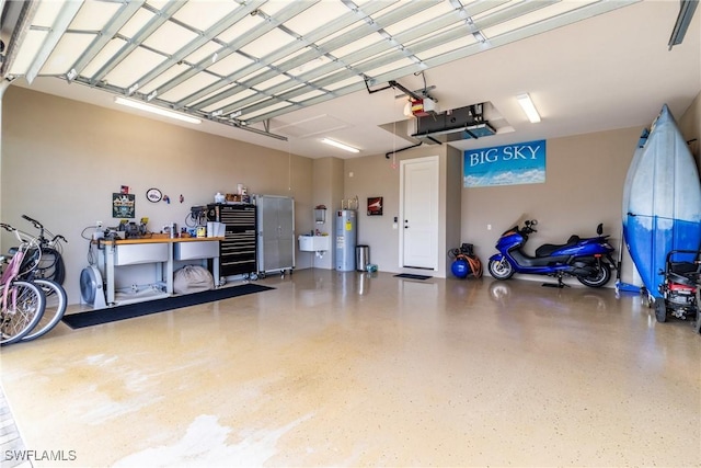 garage featuring a garage door opener and water heater