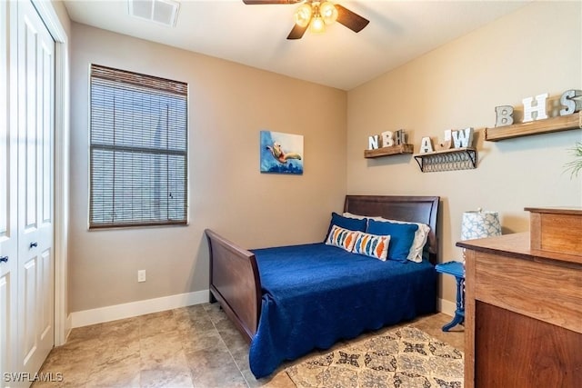 bedroom featuring a closet and ceiling fan