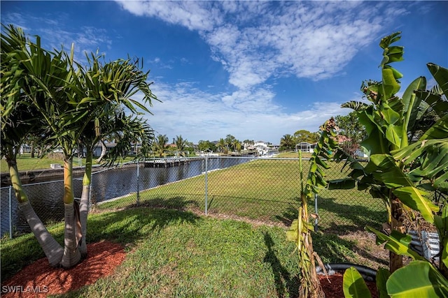 view of yard with a water view