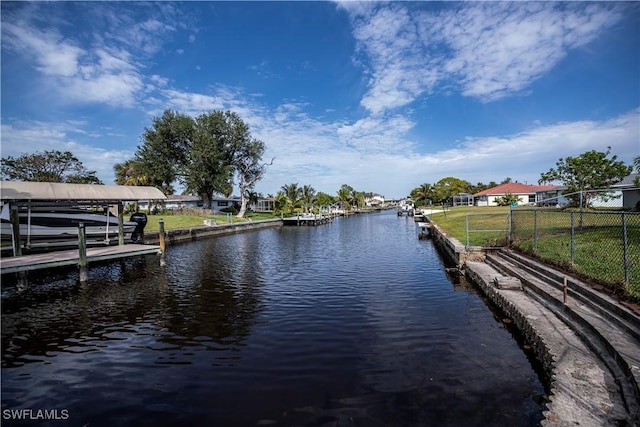 dock area with a water view