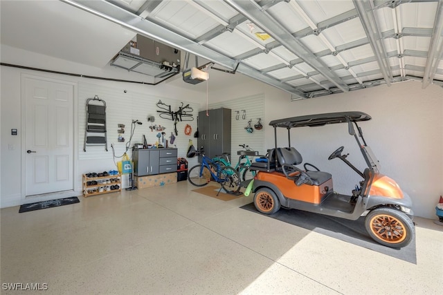 garage featuring a garage door opener