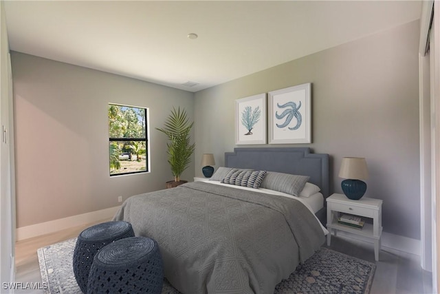 bedroom featuring light hardwood / wood-style flooring