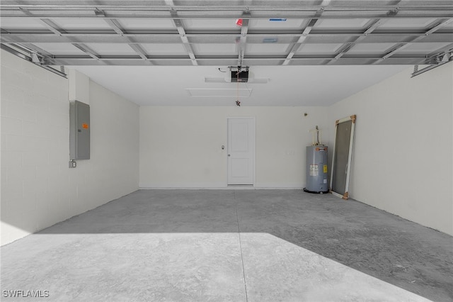 garage with electric panel, a garage door opener, and water heater