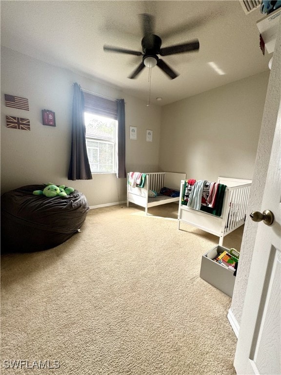 bedroom featuring carpet flooring and ceiling fan