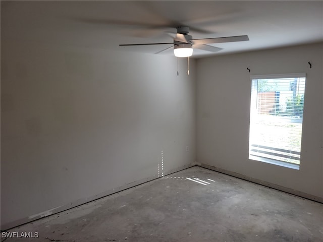 spare room featuring ceiling fan