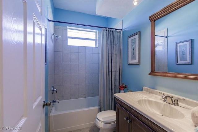 full bathroom featuring toilet, vanity, and shower / tub combo with curtain