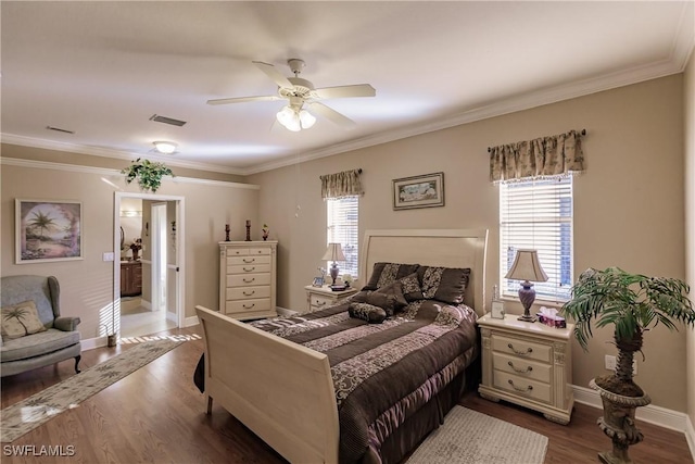 bedroom with ceiling fan, wood-type flooring, ornamental molding, and multiple windows