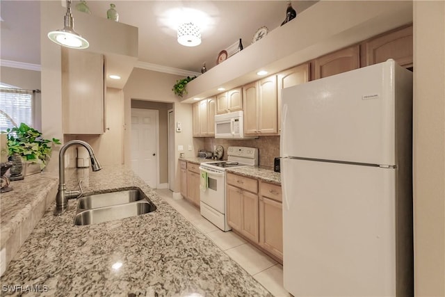 kitchen with light brown cabinets, crown molding, white appliances, and sink