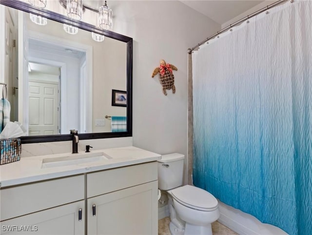 full bathroom with vanity, shower / bath combo, and toilet