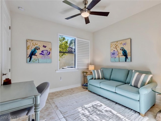 office space with ceiling fan and light tile patterned floors