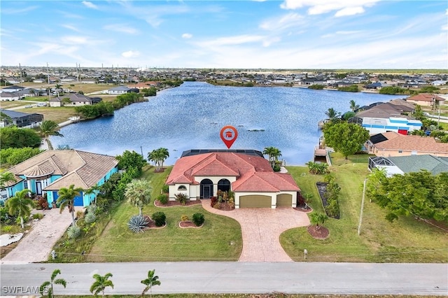 drone / aerial view with a water view