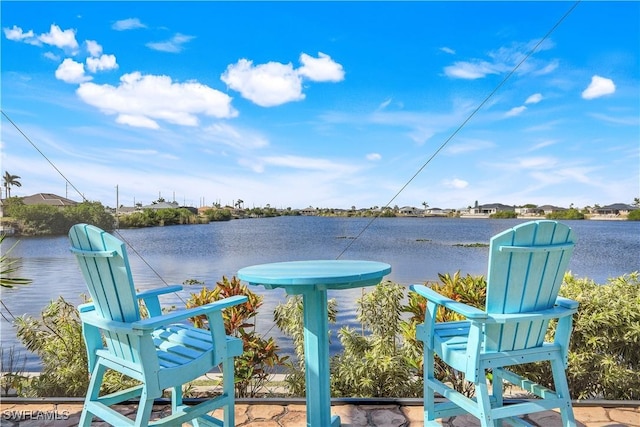 exterior space with a water view