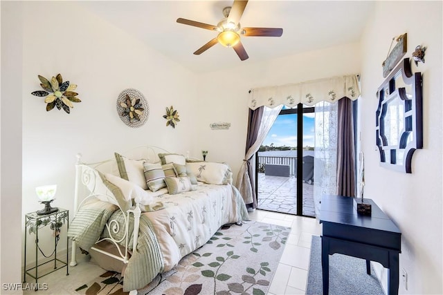 bedroom featuring access to outside, ceiling fan, and light tile patterned floors