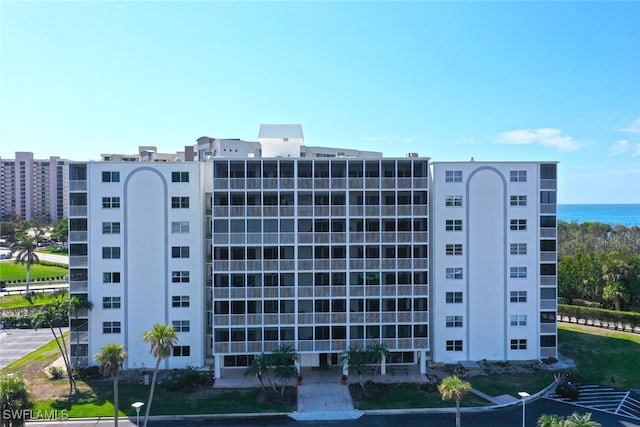 view of property with a water view