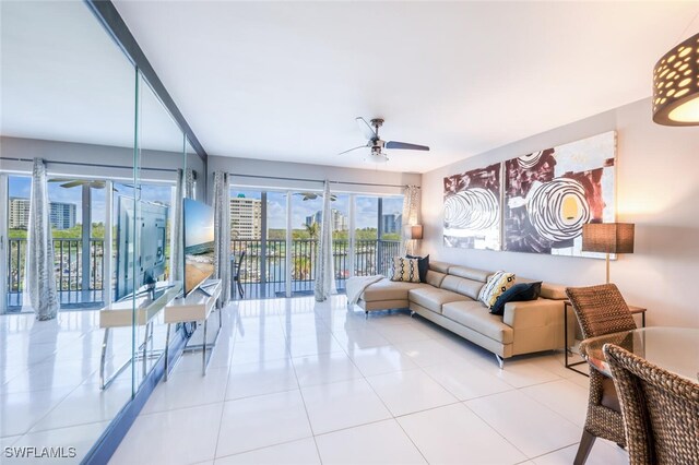 1 Bluebill Ave Unit 503, Naples, FL 34108 - tiled living area with ceiling fan