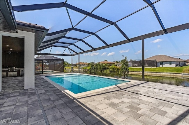 pool with a lanai and a patio area