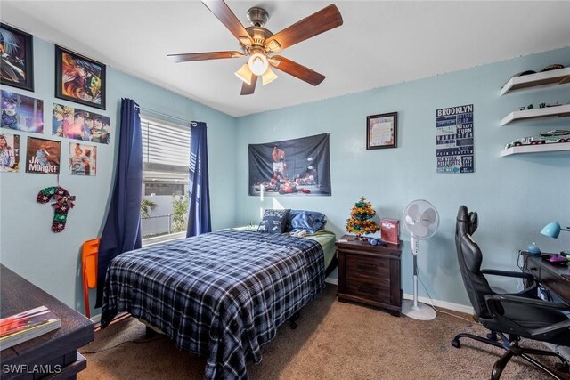 carpeted bedroom featuring ceiling fan