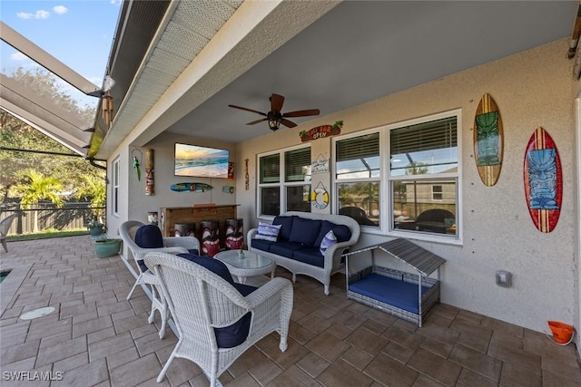 view of patio with an outdoor hangout area and ceiling fan