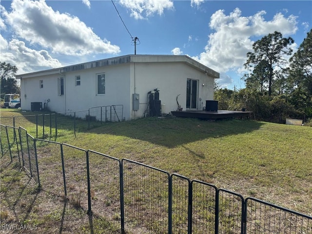 view of home's exterior featuring a lawn