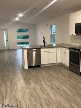 kitchen featuring white cabinetry, dishwasher, sink, black electric range, and light wood-type flooring